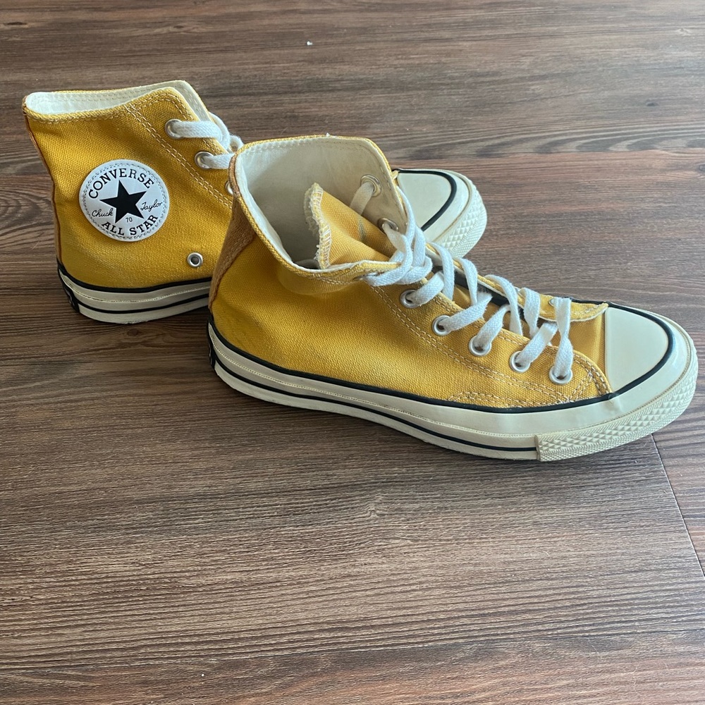 Yellow high-top Converse